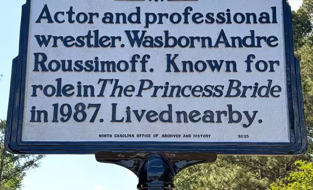 This photo provided by the North Carolina Department of Natural and Cultural Resources shows a newly-erected historical marker celebrating Andre the Giant along a highway near Ellerbe, N.C., on Thursday, April 23, 2026. (Leslie Leonard/North Carolina Department of Natural and Cultural Resources via AP)