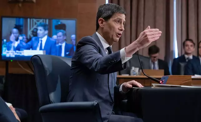 Kevin Warsh testifies during his nomination hearing to be a member and chairman of the Federal Reserve Board of Governors before the Senate Banking, Housing and Urban Affairs Committee on Capitol Hill, in Washington Tuesday, April 21, 2026. (AP Photo/Jose Luis Magana)