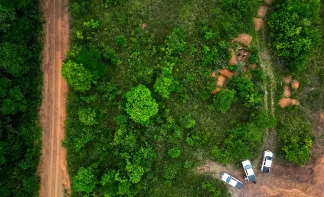 Archaeologists conduct a technical visit at Quintela archaeological site in the Vila Nova community along the BR-156 highway in Santana, Amapa state, Brazil, Saturday, March 14, 2026. (AP Photo/Eraldo Peres)