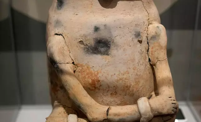 An anthropomorphic ceramic figurine found during archaeological work in a state is displayed at the Institute for Scientific and Technological Research in Macapa, Amapa state, Brazil, Sunday, March 8, 2026. (AP Photo/Eraldo Peres)