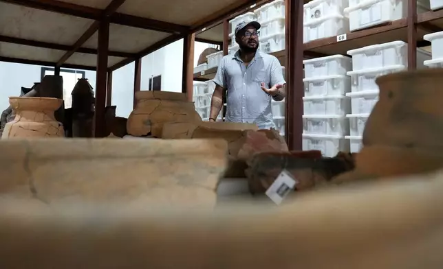 Archaeologist Lucio Flavio Costa Leite speaks about the collection of cataloged archaeological artifacts at the Institute for Scientific and Technological Research in Macapa, Amapa state, Brazil, Sunday, March 8, 2026. (AP Photo/Eraldo Peres)