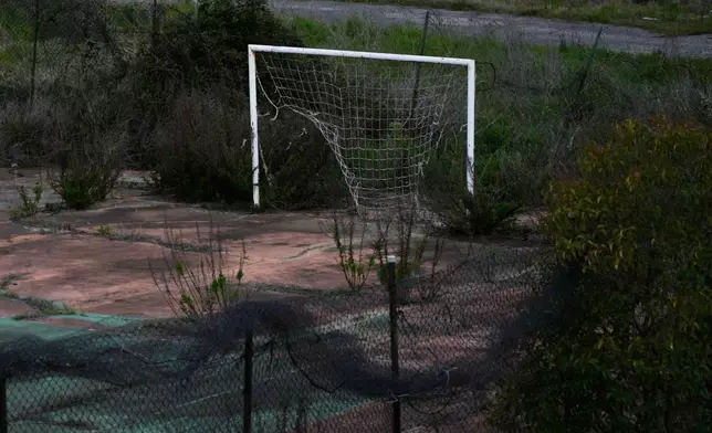 An abandoned soccer field is pictured in Rome, Wednesday, April 1, 2026. (AP Photo/Gregorio Borgia)
