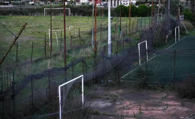 A n abandoned soccer field is pictured in Rome, Wednesday, April 1, 2026. (AP Photo/Gregorio Borgia)