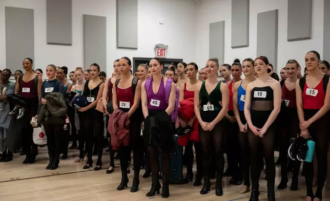 Dancers wait after an audition for the Radio City Rockettes at Radio City Music Hall in New York, on Wednesday, April 22, 2026. (AP Photo/Yuki Iwamura)