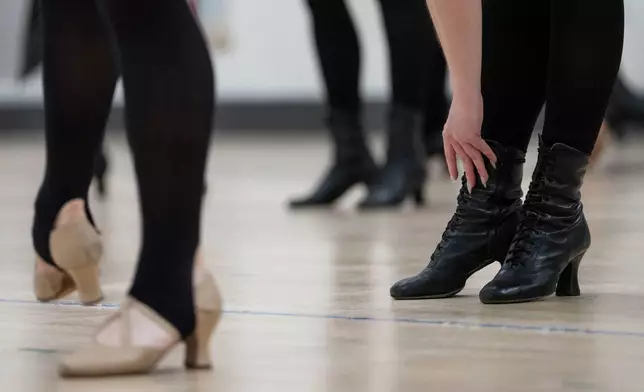 A dancer prepares for an audition for the Radio City Rockettes at Radio City Music Hall in New York, on Wednesday, April 22, 2026. (AP Photo/Yuki Iwamura)