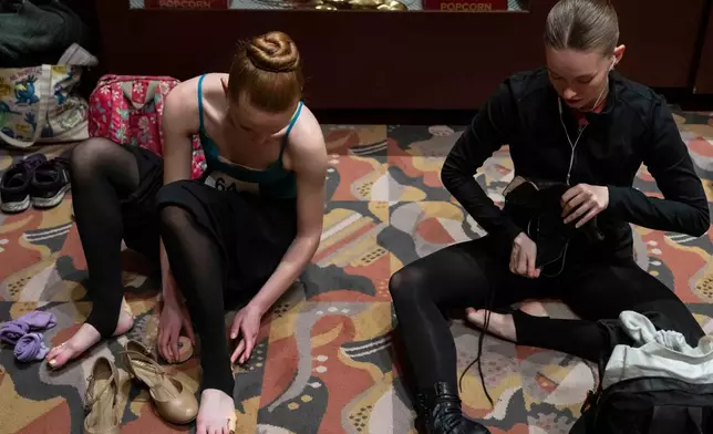 Dancers warm up and stretch before an audition for the Radio City Rockettes at Radio City Music Hall in New York, on Wednesday, April 22, 2026. (AP Photo/Yuki Iwamura)