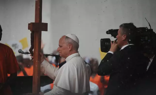 Pope Leo XIV visits the Bata Prison, Equatorial Guinea, Wednesday, April 22, 2026. (AP Photo/Andrew Medichini)