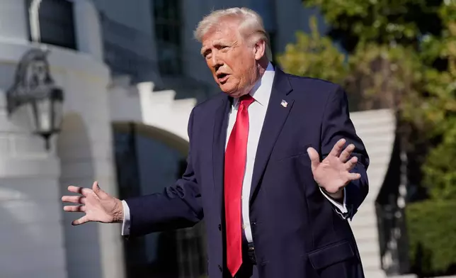 President Donald Trump talks to the media on the South Lawn before departing on Marine One at the White House, Saturday, April 11, 2026, in Washington. (AP Photo/Jose Luis Magana)