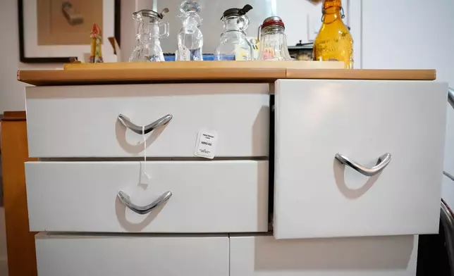 Furniture is for sale at Mothership, a vintage and thrift store, Thursday, March 26, 2026, in New York. (AP Photo/Alyssa Goodman)