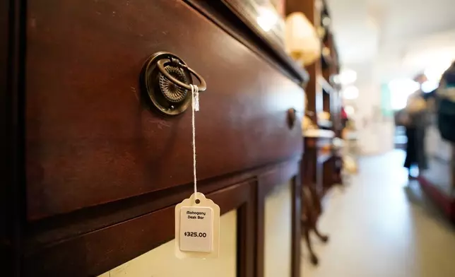 Furniture is for sale at Mothership, a vintage and thrift store, Thursday, March 26, 2026, in New York. (AP Photo/Alyssa Goodman)