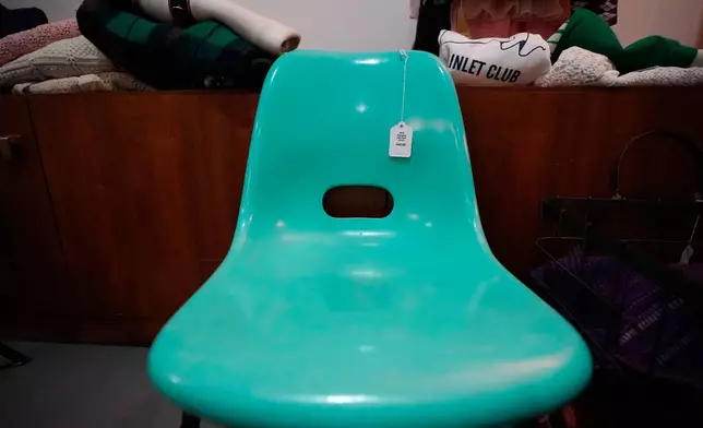 A chair is for sale at Mothership, a vintage and thrift store, Thursday, March 26, 2026, in New York. (AP Photo/Alyssa Goodman)