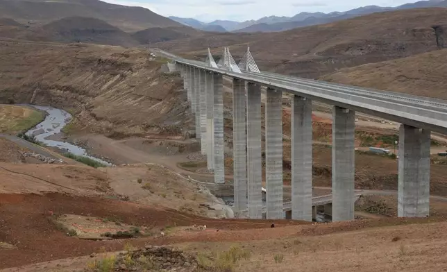 This photo provided by the South African Government Communications and Information Services (GCIS), shows the Senqu Bridge in Mokhotlong, Lesotho, Wednesday, April 22, 2026. (Elmond Jiyane/South African Government Communication and Information Services via AP)