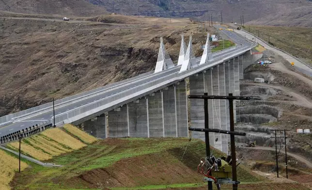 This photo provided by the South African Government Communications and Information Services (GCIS), shows the Senqu Bridge in Mokhotlong, Lesotho, Wednesday, April 22, 2026. (Elmond Jiyane/South African Government Communication and Information Services via AP)