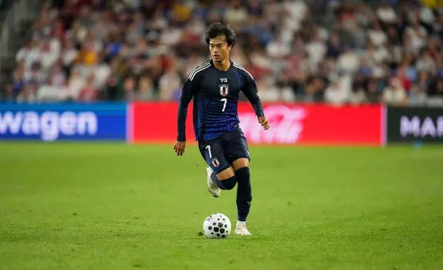 FILE - Japan's Kaoru Mitoma (7) controls the ball during a friendly soccer match against the United States, Tuesday, Sept. 9, 2025, in Columbus, Ohio. (AP Photo/Jeff Dean, File)