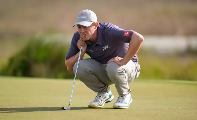 Matt Fitzpatrick, of England, prepares to putt on the 18th hole during the third round of the RBC Heritage golf tournament Saturday, April 18, 2026, in Hilton Head, S.C. (AP Photo/Mike Stewart)