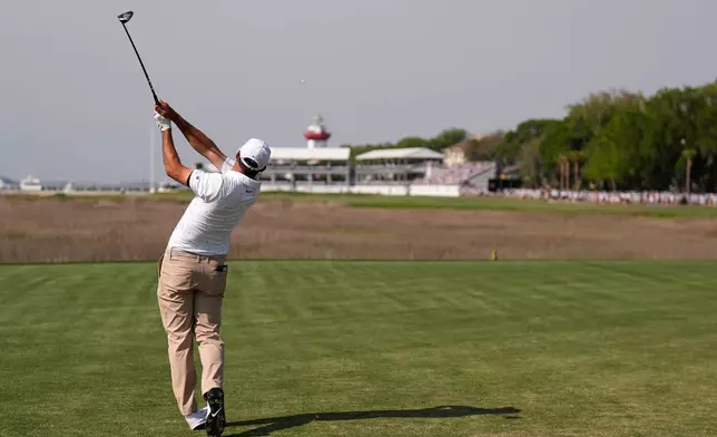 Scottie Scheffler hits from the 18th tee during the third round of the RBC Heritage golf tournament Saturday, April 18, 2026, in Hilton Head, S.C. (AP Photo/Mike Stewart)