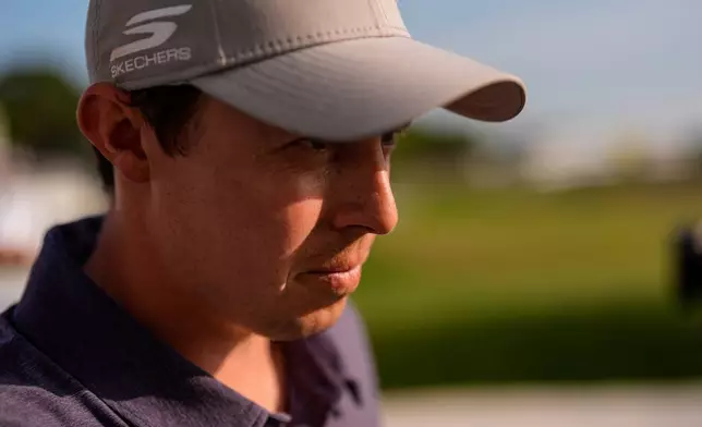Matt Fitzpatrick leaves the 18th green during the third round at the RBC Heritage golf tournament, Saturday, April 18, 2026, in Hilton Head Island, S.C. (AP Photo/Mike Stewart)