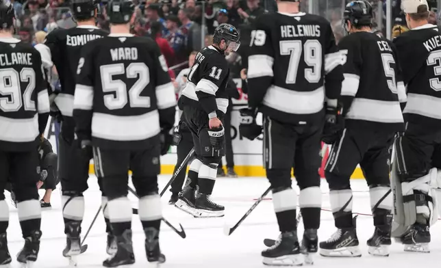 After the final game of his career, Los Angeles Kings' Anze Kopitar (11) skates off the ice following Game 4 in the first round of an NHL hockey Stanley Cup playoff series against the Colorado Avalanche, Sunday, April 26, 2026, in Los Angeles. (AP Photo/Scott Strazzante)