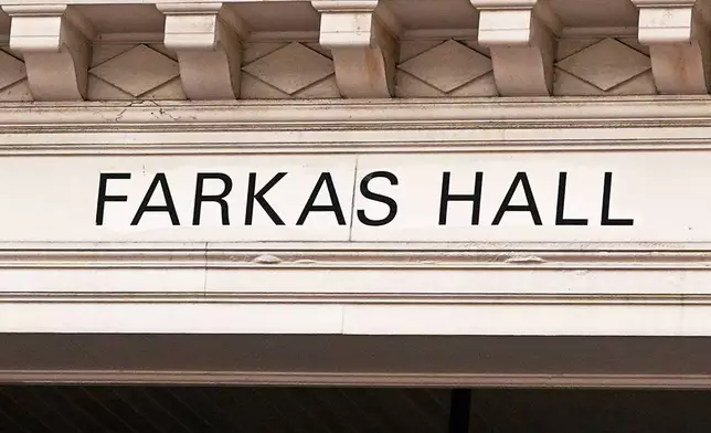 A sign is displayed on Farkas Hall, which was endowed by Harvard University alum Andrew Farkas, Friday, Jan. 31, 2025, in Cambridge, Mass. (AP Photo/Charles Krupa, File)