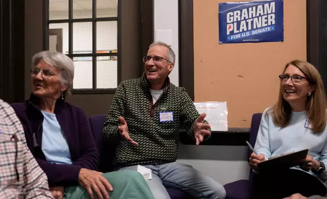 Dave Harvey participates in a trivia night for supporters of U.S. Senate candidate Graham Platner, Thursday, March 26, 2026, in Kittery, Maine. (AP Photo/Robert F. Bukaty)