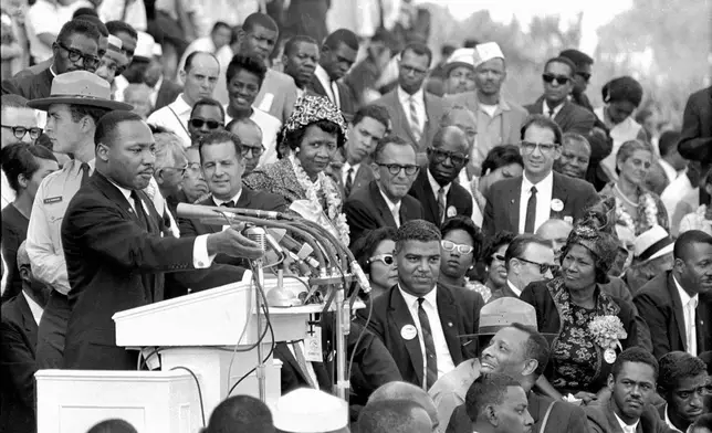 FILE - The Rev. Dr. Martin Luther King Jr., head of the Southern Christian Leadership Conference, speaks to thousands during his "I Have a Dream" speech in front of the Lincoln Memorial for the March on Washington for Jobs and Freedom, Aug. 28, 1963, in Washington. (AP Photo/File)