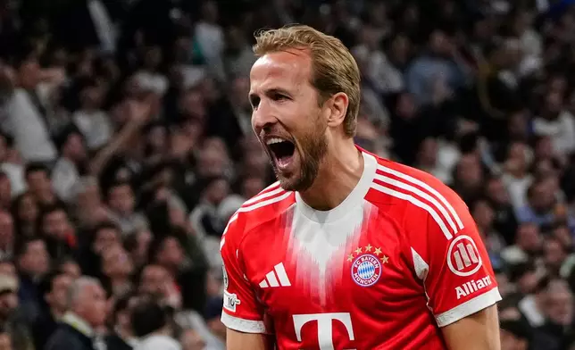 Bayern's Harry Kane celebrates scoring his side's second goal during the Champions League quarterfinal first leg soccer match between Real Madrid and Bayern Munich in Madrid, Spain, Tuesday, April 7, 2026. (AP Photo/Jose Breton)