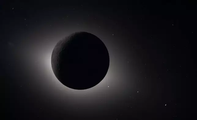 In this image provided by NASA, The Artemis II crew captured from lunar orbit, the Moon eclipses the Sun on Monday, April 6, 2026. (NASA via AP)