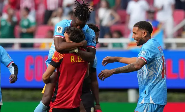 DR Congo's players celebrate at the end of the World Cup playoff final soccer match between DR Congo and Jamaica in Guadalajara, Mexico, Tuesday, March 31, 2026. (AP Photo/Eduardo Verdugo)