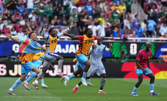 DR Congo's players celebrate at the end of the World Cup playoff final soccer match between DR Congo and Jamaica in Guadalajara, Mexico, Tuesday, March 31, 2026. (AP Photo/Eduardo Verdugo)