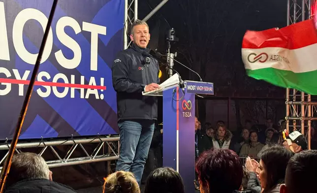 Hungarian opposition leader Peter Magyar addresses people during an election rally in Kiskunhalas, Hungary, Thursday, April 2, 2026. (AP Photo/Bela Szandelszky)