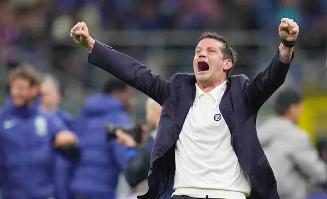 Inter Milan's head coach Cristian Chivu reacts after the Italian Cup, second-leg soccer match between Inter Milan and Como, in Milan, Italy, Tuesday, April 21, 2026. (Spada/LaPresse via AP)