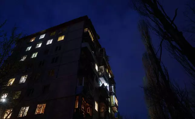 Rescue workers clear the rubble of a house damaged after a Russian strike on residential area in Kyiv, Ukraine, on Thursday, April 16, 2026. (AP Photo/Evgeniy Maloletka)