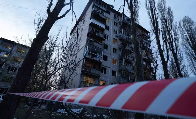 A house is seen damaged after a Russian strike on residential neighbourhood in Kyiv, Ukraine, on Thursday, April 16, 2026. (AP Photo/Evgeniy Maloletka)