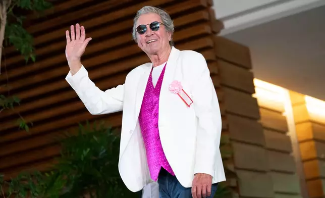 Ian Gillanat, a member of British rock band Deep Purple leaves after a meeting with Japan's Prime Minister Sanae Takaichi at the Prime Minister's Office in Tokyo, Friday, April 10, 2026. (Yuichi Yamazaki/Pool Photo via AP)