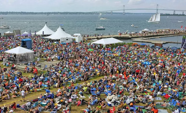 FILE - Music fans fill the grounds of Fort Adams State Park on Narragansett Bay for the Newport Jazz Festival in Newport, R.I., on Aug. 2, 2013. (AP Photo/Joe Giblin, File)