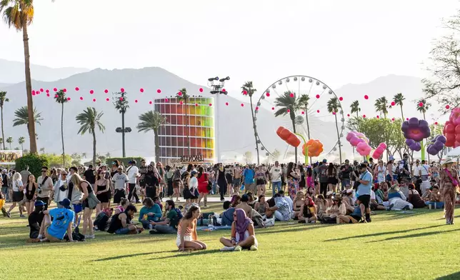 FILE - Festivalgoers appear at the Coachella Valley Music and Arts Festival in Indio, Calif., on April 13, 2025. (Photo by Amy Harris/Invision/AP, File)