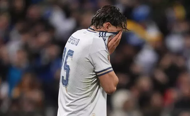 Italy's Pio Esposito reacts after missing a penalty kick during a World Cup qualifying playoff final soccer match between Bosnia and Italy in Zenica, Bosnia, Tuesday, March 31, 2026. (Fabio Ferrari/LaPresse via AP)