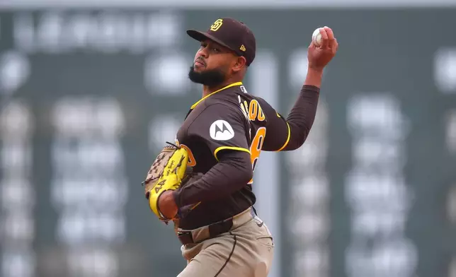 San Diego Padres' Randy Vásquez delivers a pitch to a Boston Red Sox batter in the first inning of a baseball game, Saturday, April 4, 2026, in Boston. (AP Photo/Steven Senne)