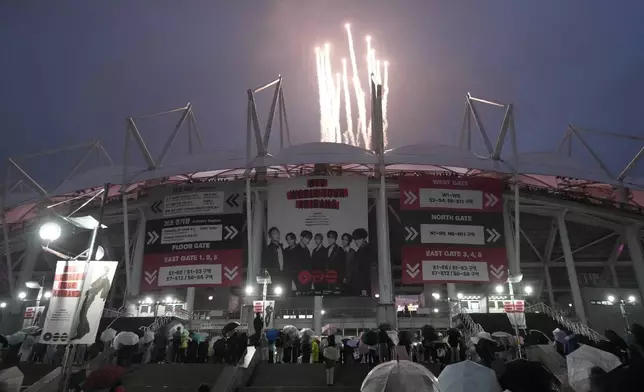 Fireworks explode at the stadium where K-pop band BTS is performing for their World Tour Arirang in Goyang, South Korea, Thursday, April 9, 2026. (AP Photo/Lee Jin-man)