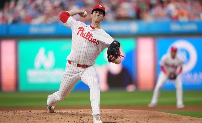 Philadelphia Phillies' Andrew Painter pitches during the second inning of a baseball game against the Washington Nationals, Tuesday, March 31, 2026, in Philadelphia. (AP Photo/Matt Rourke)