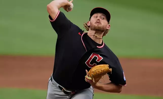 Cleveland Guardians pitcher Tanner Bibee (28) works against the Atlanta Braves in the first inning of a baseball game, Sunday, April 12, 2026, in Atlanta. (AP Photo/Mike Stewart)