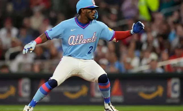 Atlanta Braves' Jorge Mateo (2) runs after hitting an RBIsingle in the second inning of a baseball game against the Cleveland Guardians, Sunday, April 12, 2026, in Atlanta. (AP Photo/Mike Stewart)