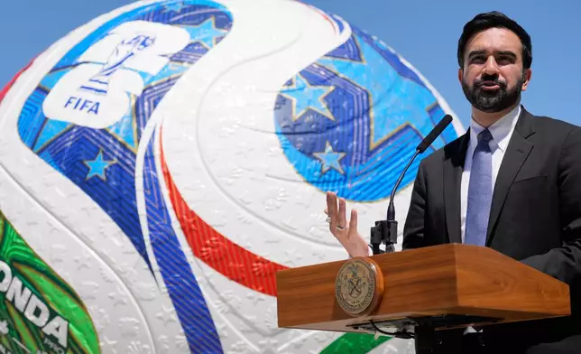 New York City Mayor Zohran Mamdani speaks in front of a large soccer ball during a news conference in the Staten Island borough of New York, Monday, April 27, 2026. (AP Photo/Seth Wenig)