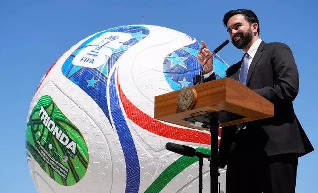 New York City Mayor Zohran Mamdani speaks in front of a large soccer ball during a news conference in the Staten Island borough of New York, Monday, April 27, 2026. (AP Photo/Seth Wenig)