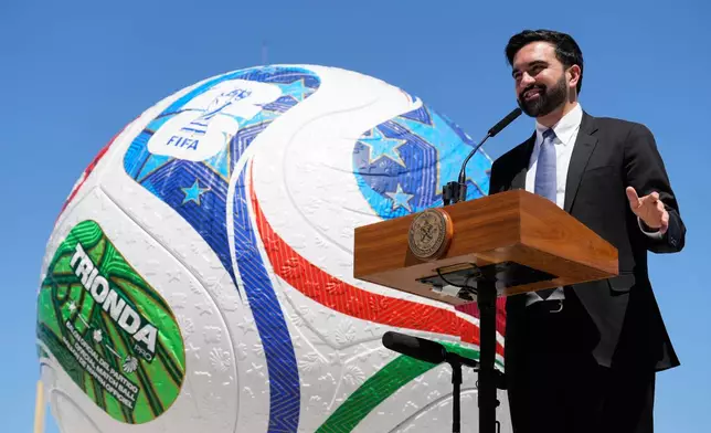 New York City Mayor Zohran Mamdani speaks in front of a large soccer ball during a news conference in the Staten Island borough of New York, Monday, April 27, 2026. (AP Photo/Seth Wenig)