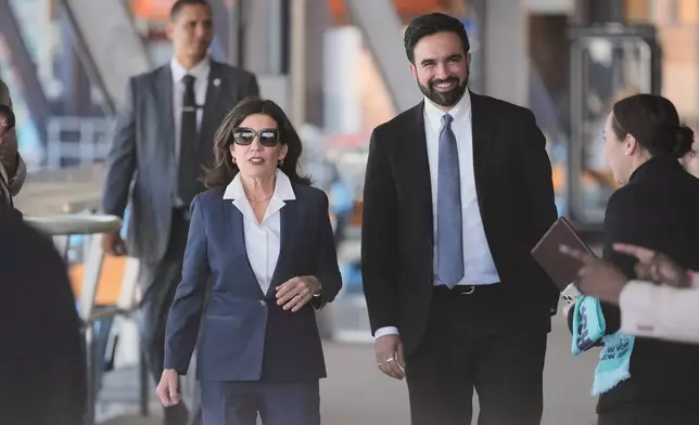 New York Gov. Kathy Hochul and New York City Mayor Zohran Mamdani arrive to a news conference in the Staten Island borough of New York, Monday, April 27, 2026. (AP Photo/Seth Wenig)