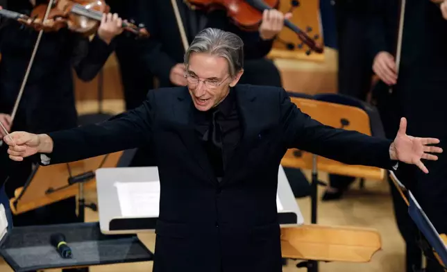 FILE - Michael Tilson Thomas, founder and artistic director of the New World Symphony, appears during the grand opening ceremony of the New World Center on Jan. 25, 2011 in Miami Beach, Fla. (AP Photo/Lynne Sladky, File)