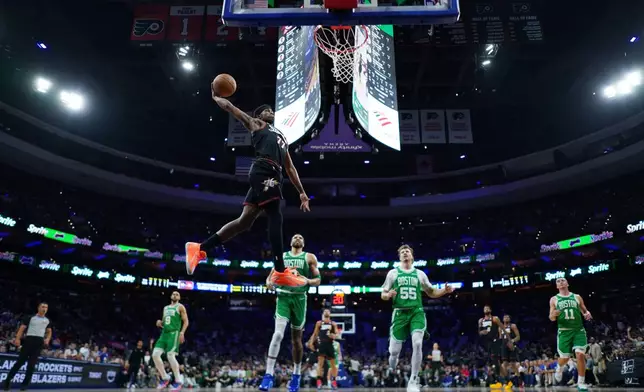 Philadelphia 76ers' VJ Edgecombe goes up for a dunk during the first half of Game 3 against the Boston Celtics in a first-round NBA playoffs basketball series Friday, April 24, 2026, in Philadelphia. (AP Photo/Matt Slocum)