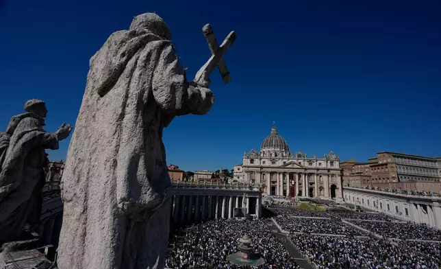 Pope Leo XIV presides over Easter Mass in St. Peter's Square at the Vatican, Sunday, April 5, 2026 (AP Photo/Alessandra Tarantino)