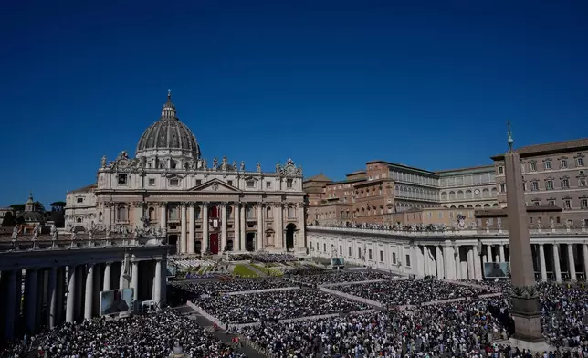 Pope Leo XIV presides over Easter Mass in St. Peter's Square at the Vatican, Sunday, April 5, 2026 (AP Photo/Alessandra Tarantino)
